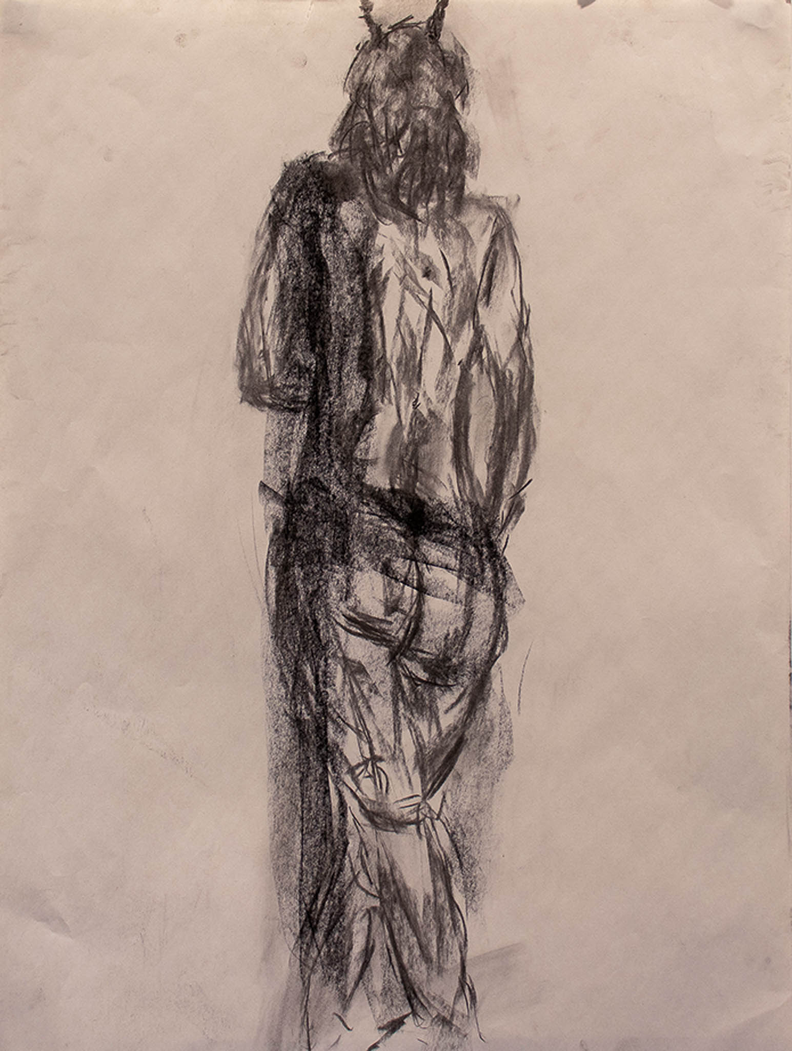 charcoal drawing of a woman standing with her back turned