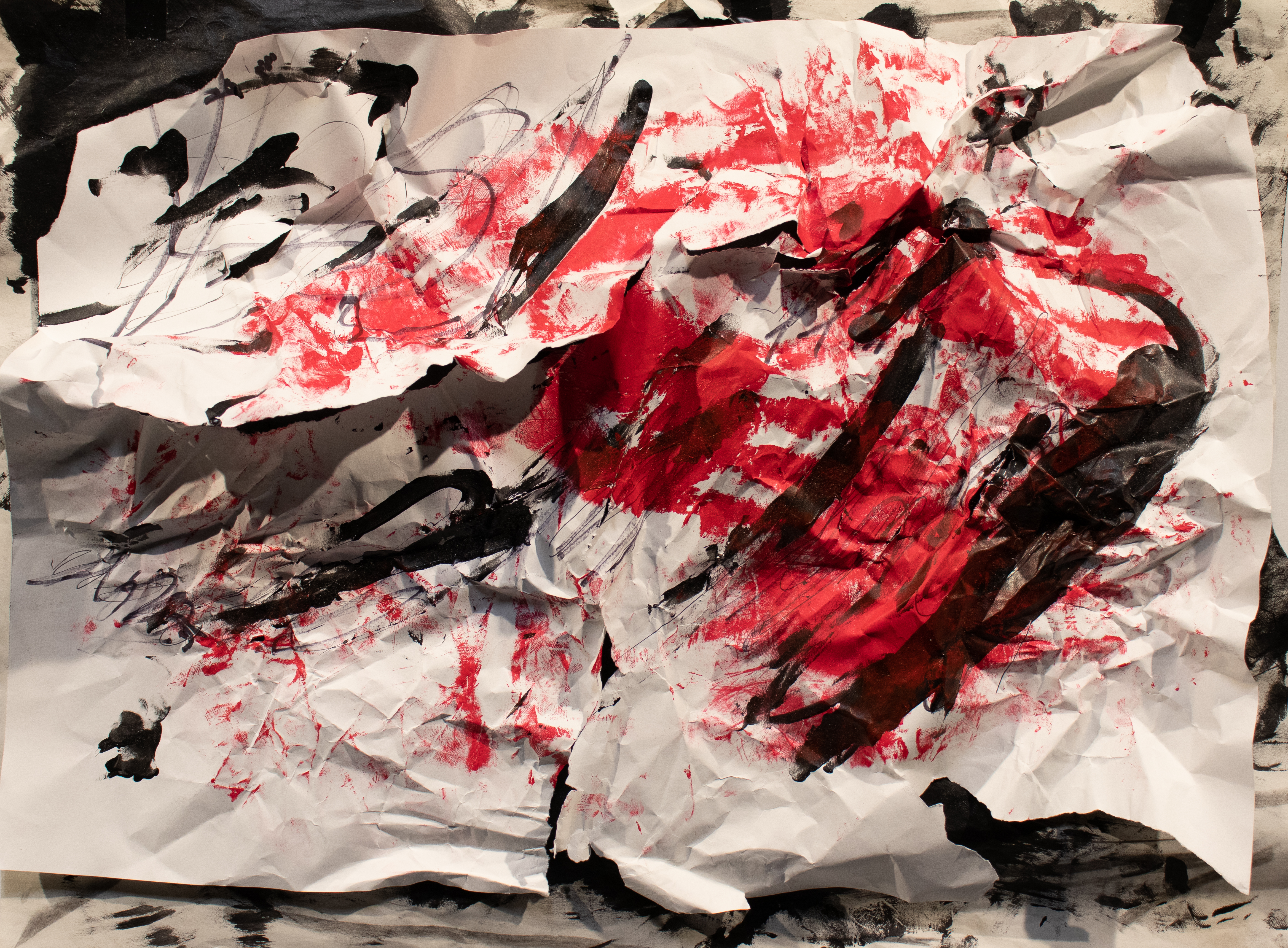 torn paper with marks